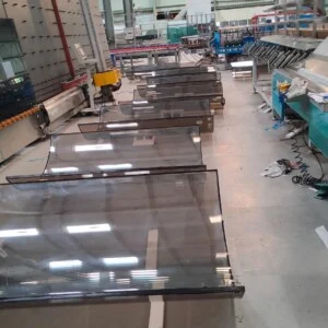 Raw Bent Glass on machinery